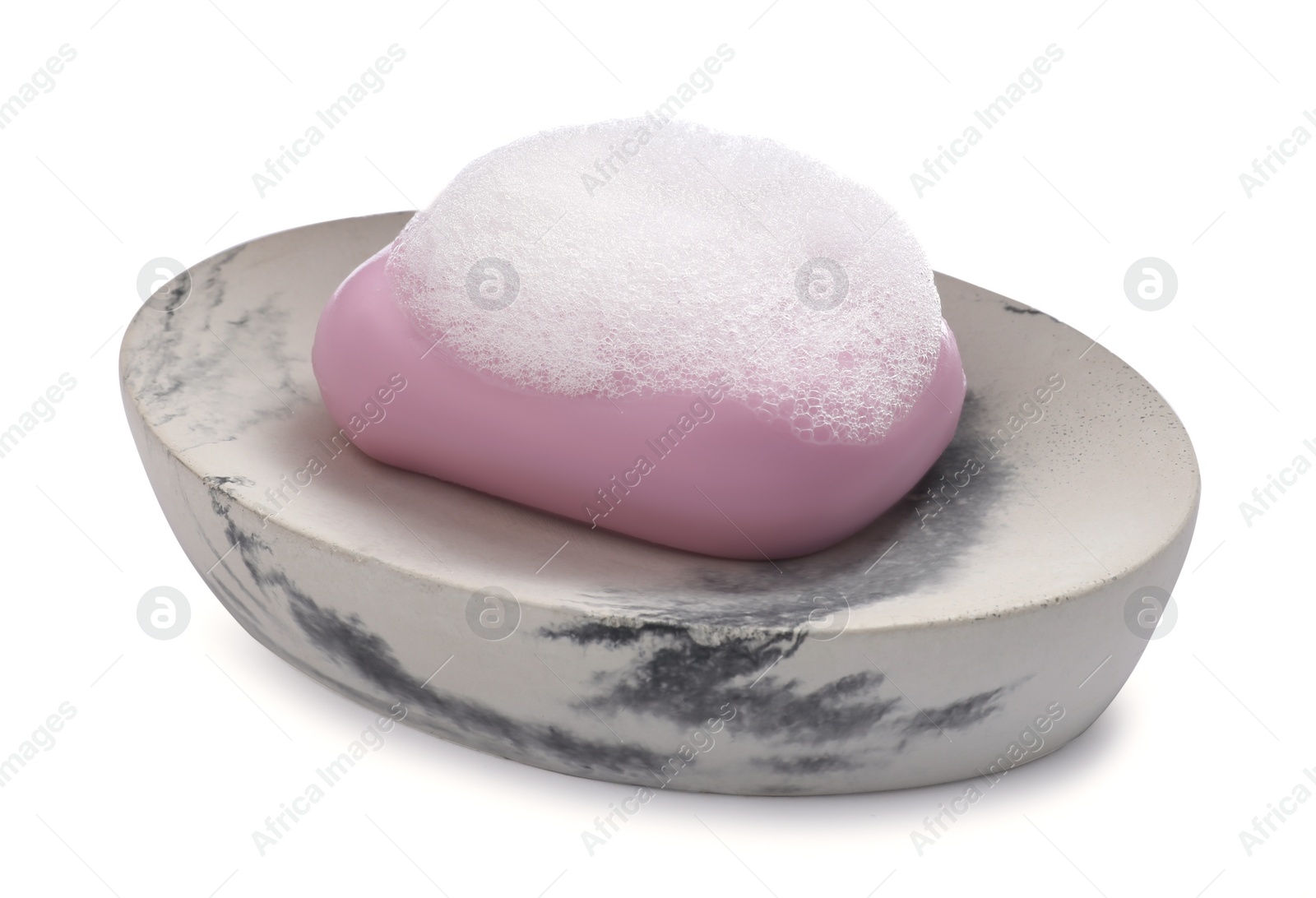 Photo of Soap bar with fluffy foam in holder on white background