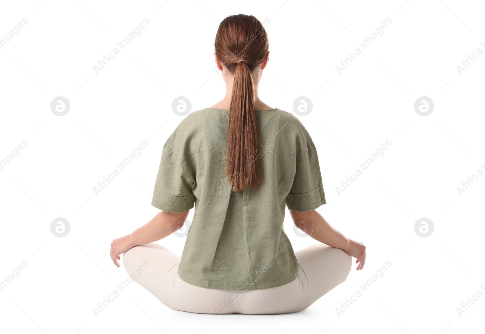 Photo of Young woman meditating on white background, back view