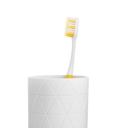 Photo of One plastic toothbrush in holder isolated on white