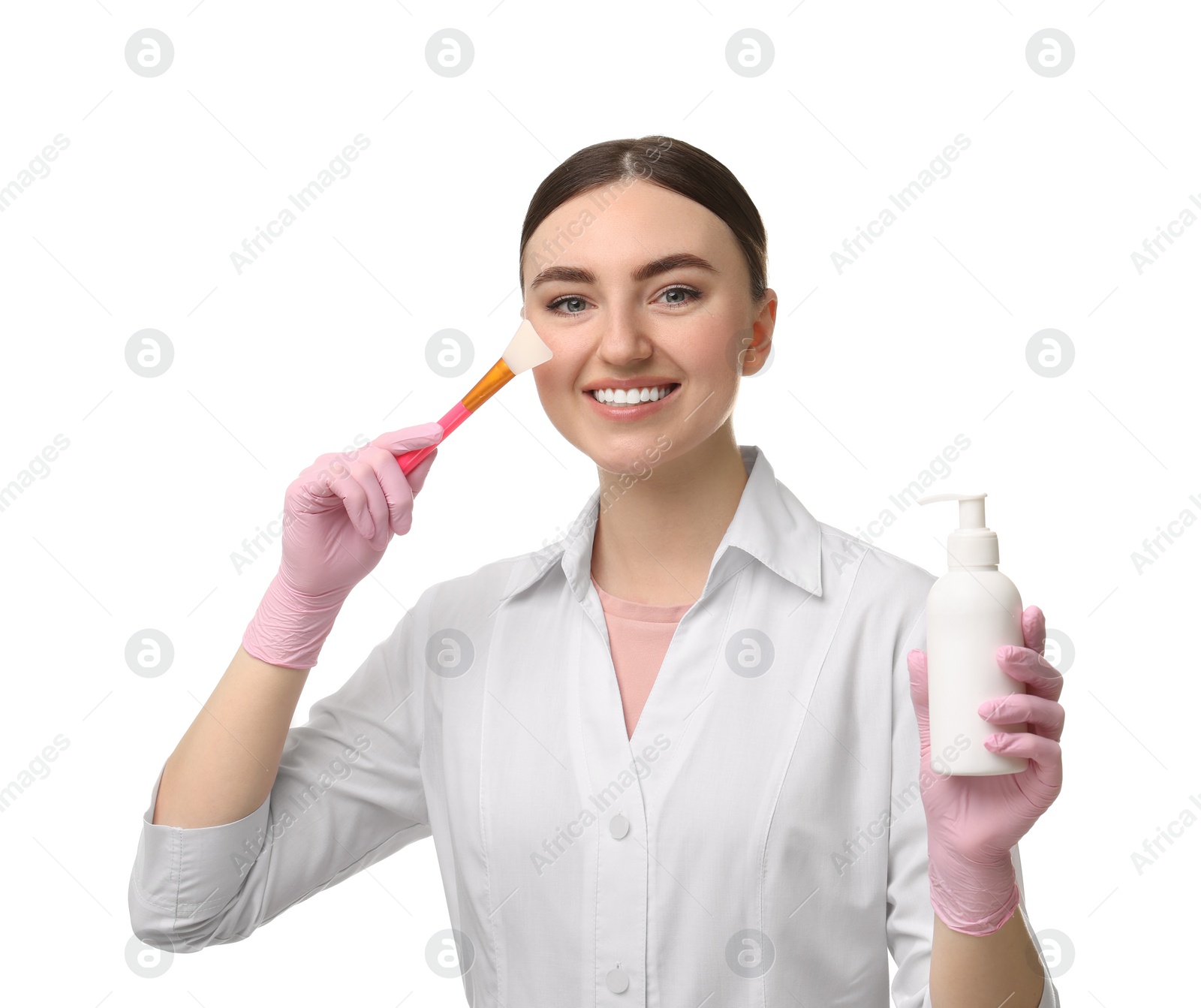 Photo of Cosmetologist with silicone brush and cosmetic product on white background