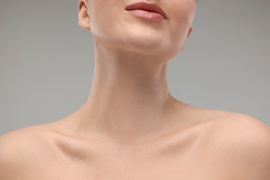 Beauty concept. Woman on grey background, closeup