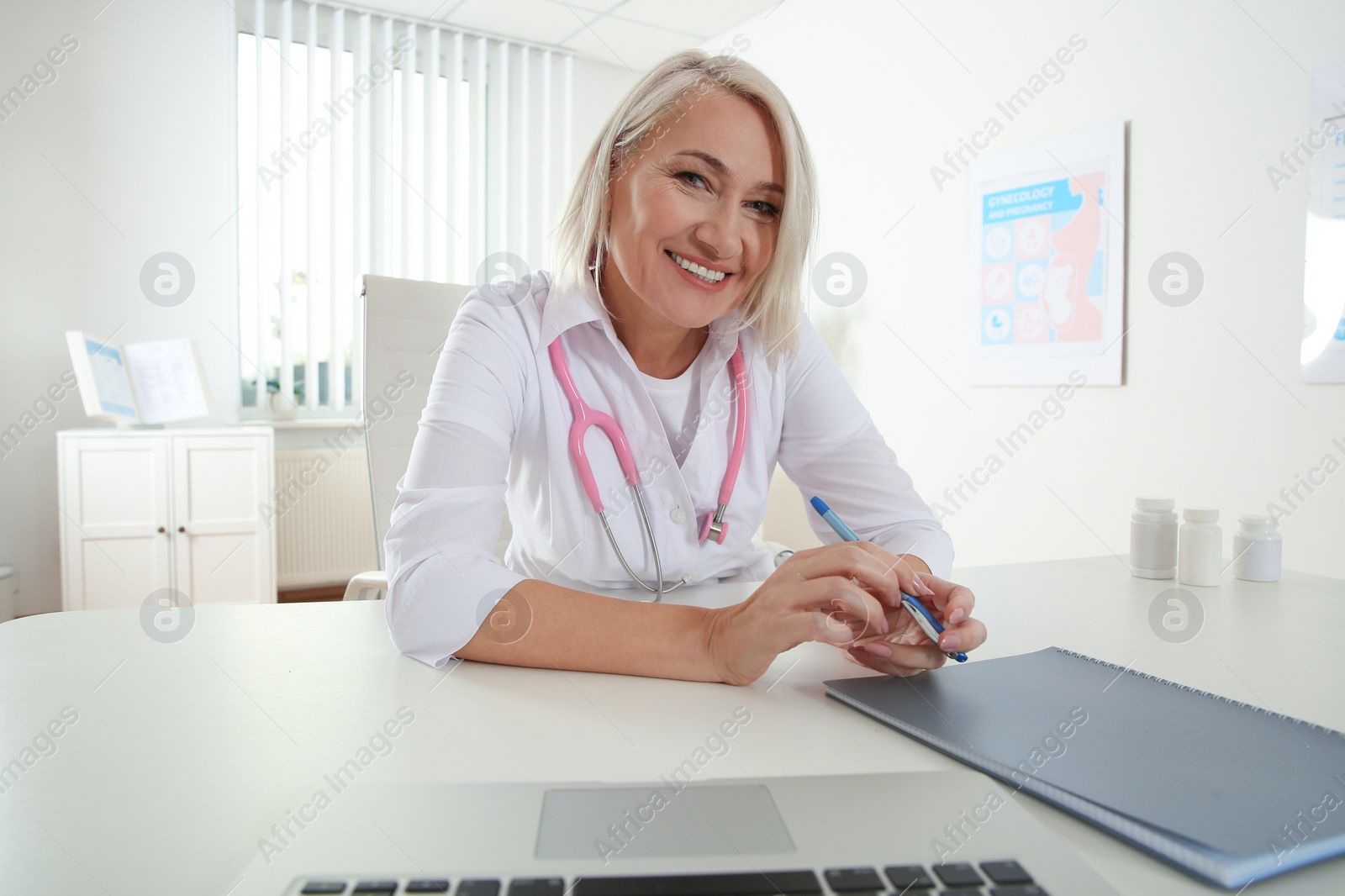 Photo of Doctor consulting patient using video chat in clinic, view from web camera