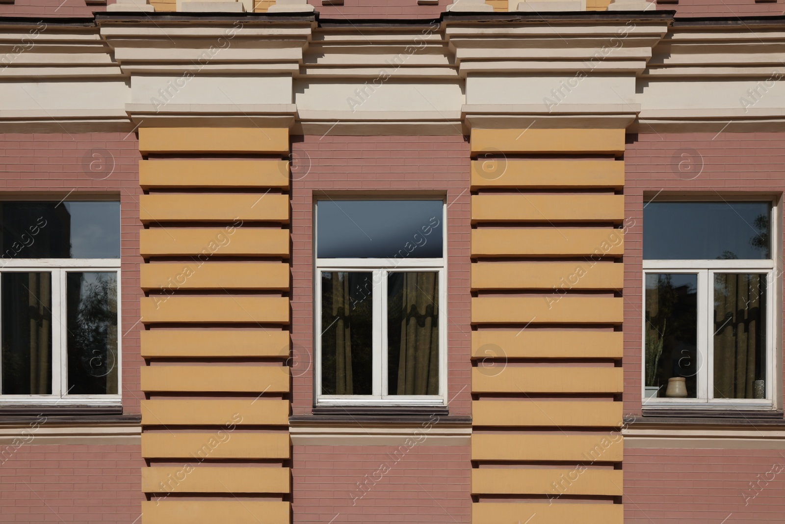 Photo of Wall of vintage building with beautiful windows