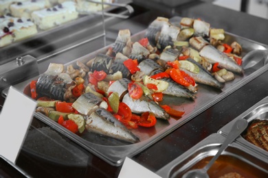 Photo of Containers with healthy food in school canteen