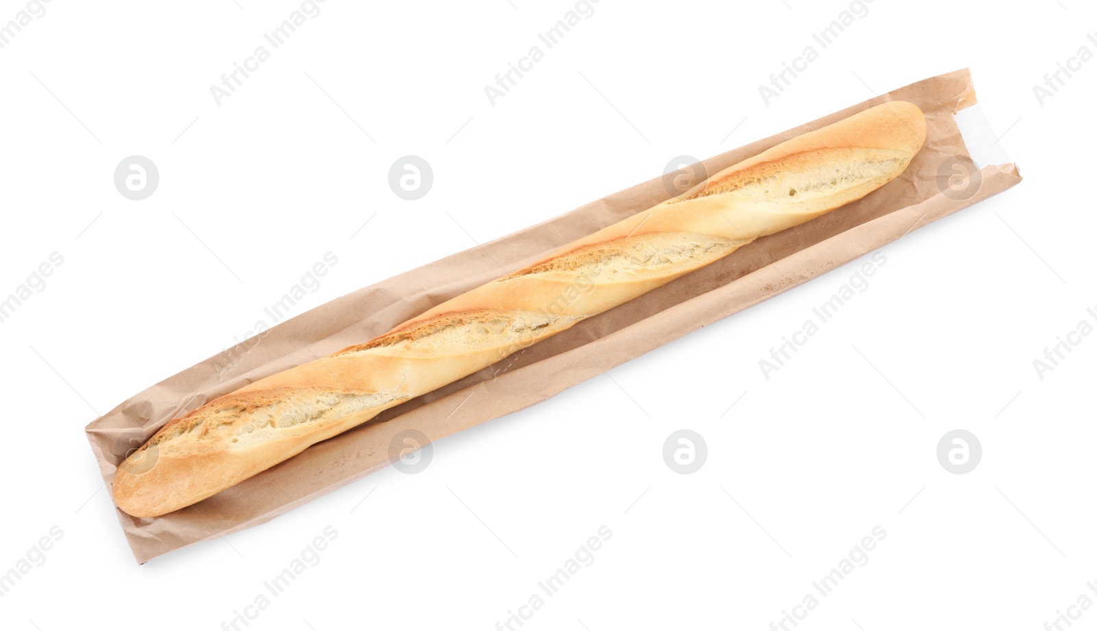 Photo of Tasty baguette and package isolated on white, top view. Fresh bread