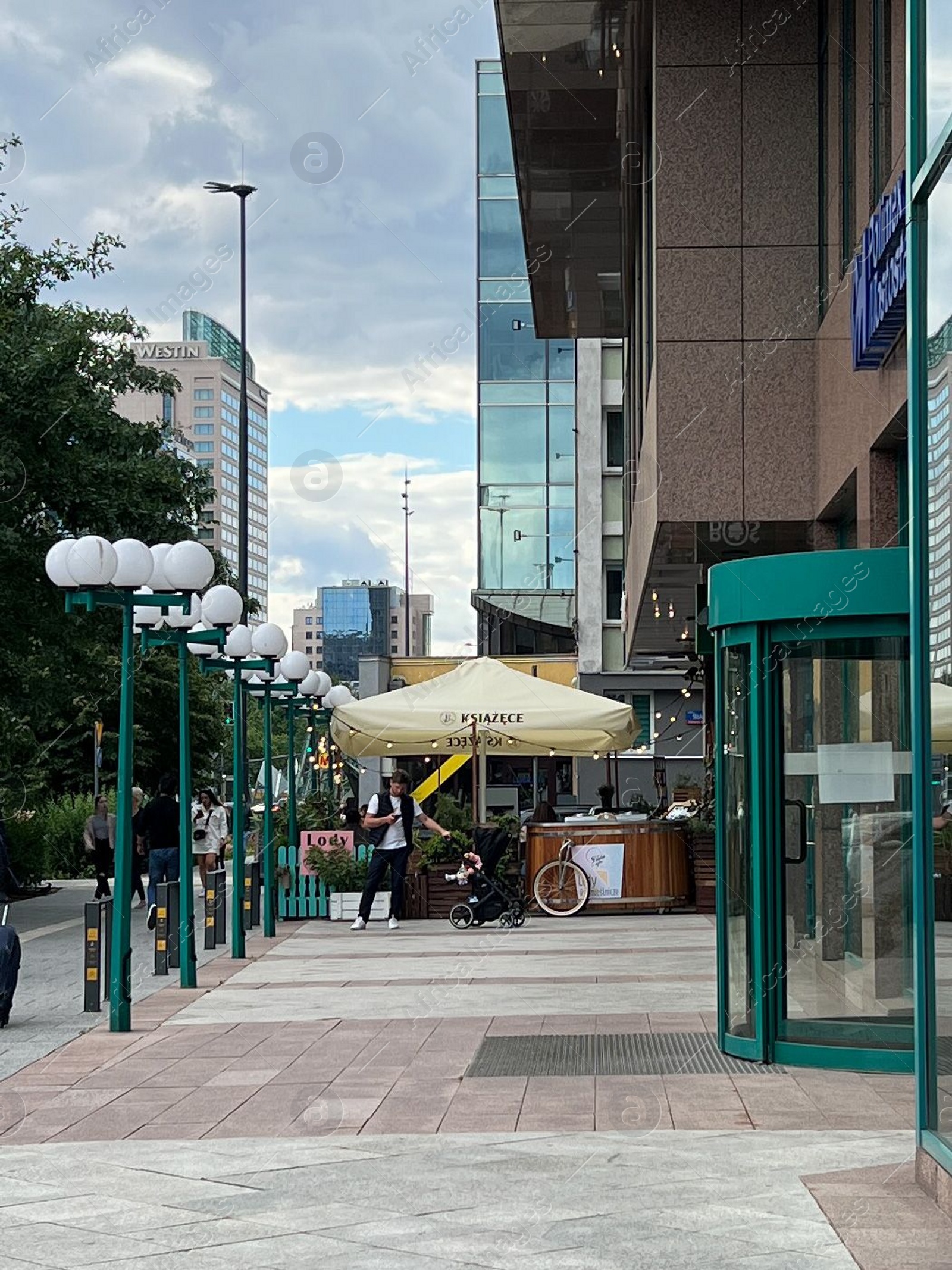 Photo of WARSAW, POLAND - JULY 17, 2022: Beautiful view of modern cafe with outdoor terrace