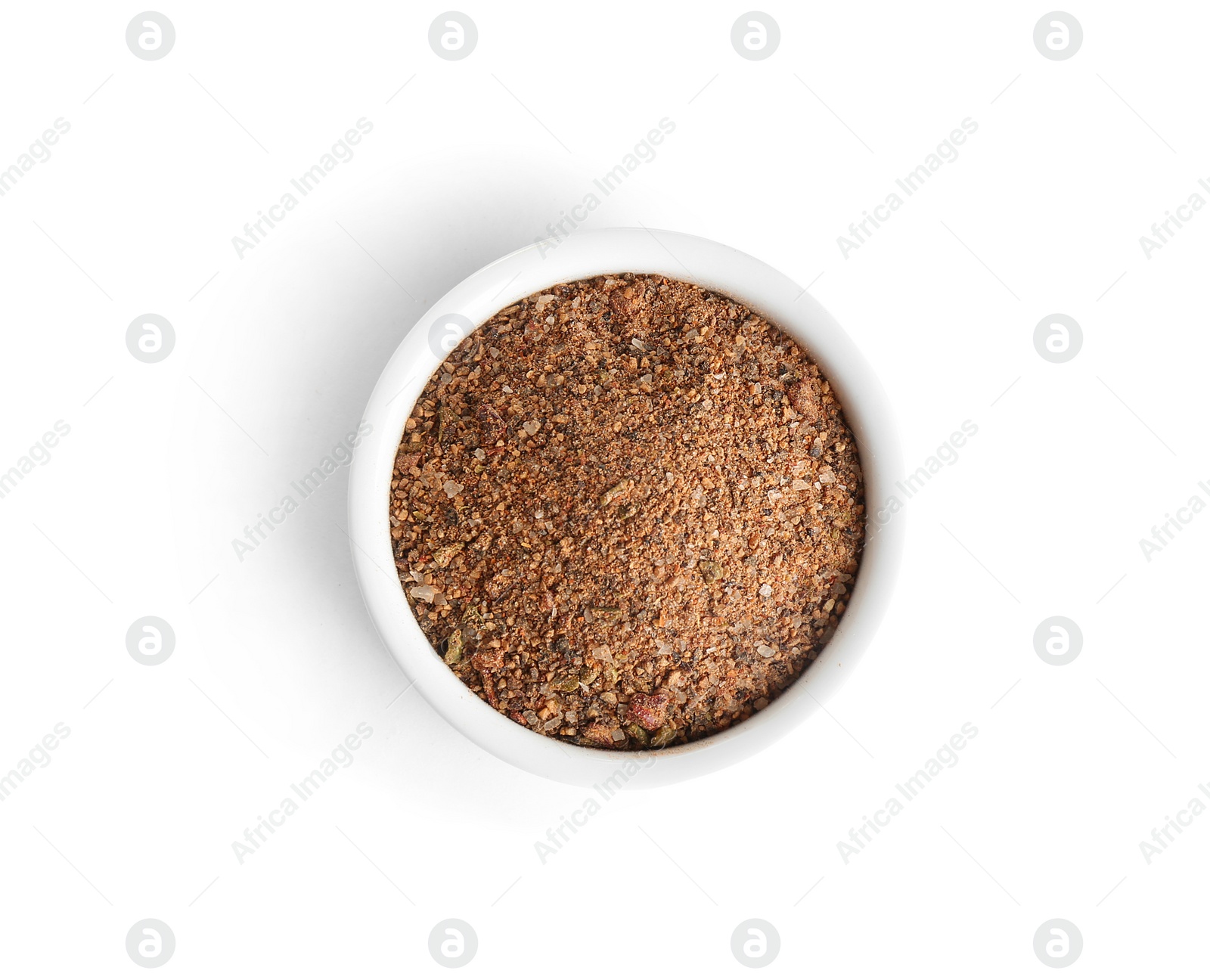 Photo of Bowl of ground pepper isolated on white, top view