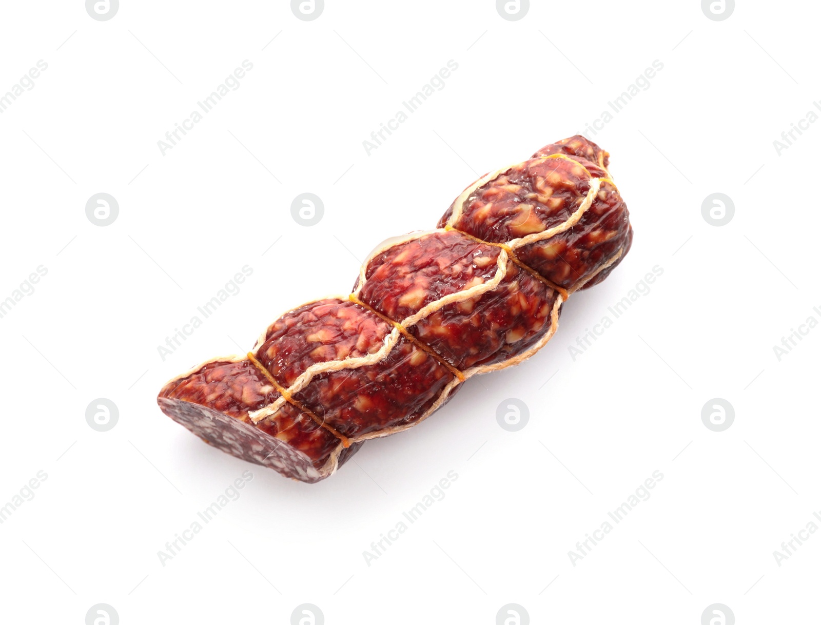 Photo of Tasty cut salami on white background, top view. Meat product