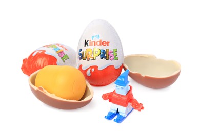 Photo of Slynchev Bryag, Bulgaria - May 23, 2023: Kinder Surprise Eggs, plastic capsule and toy on white background