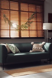 Photo of Stylish room decorated with beautiful eucalyptus garland