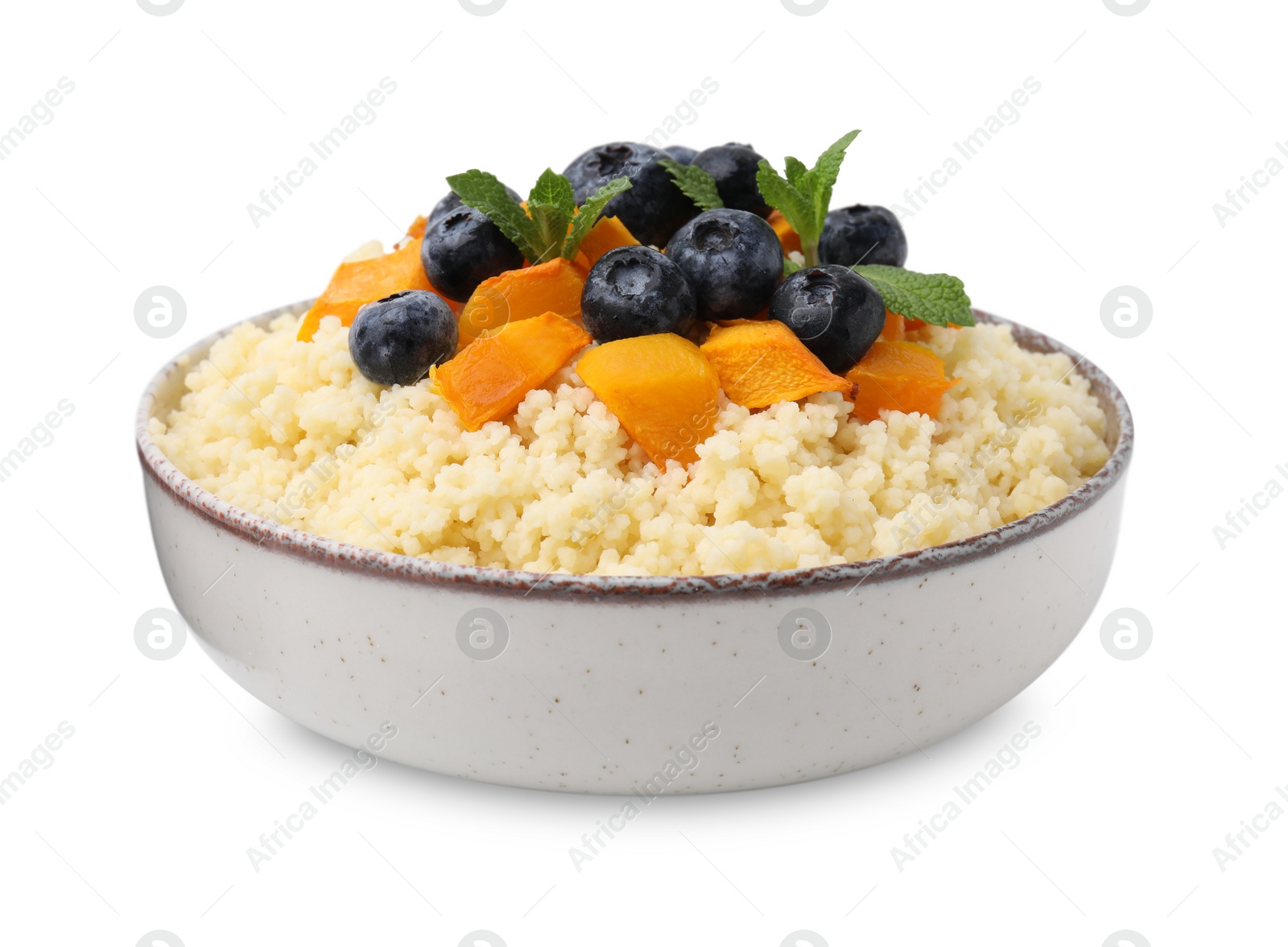 Photo of Bowl of tasty couscous with blueberries, pumpkin and mint isolated on white