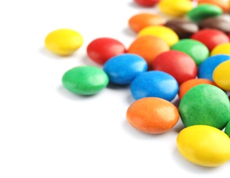 Photo of Pile of colorful candies on white background