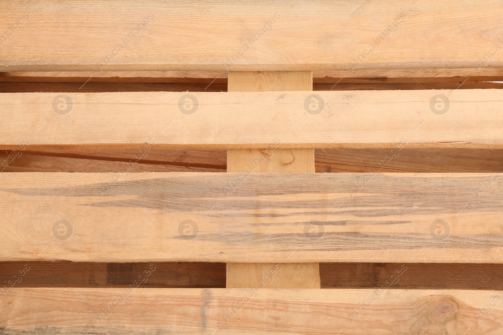 Photo of Wooden pallet as background, top view. Transportation and storage