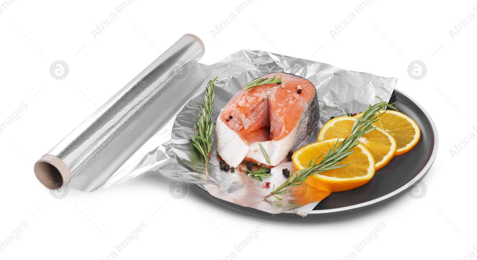 Photo of Aluminum foil with raw salmon, orange slices, rosemary and spices isolated on white