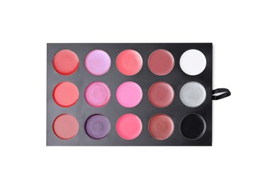 Photo of Cream lipstick palette isolated on white, top view. Professional cosmetic product