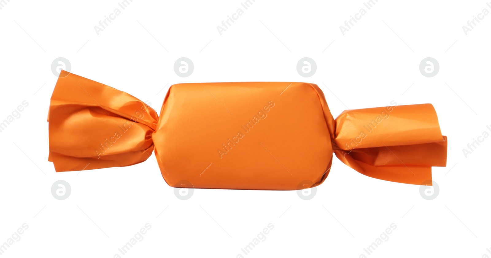 Photo of Delicious candy in orange wrapper isolated on white