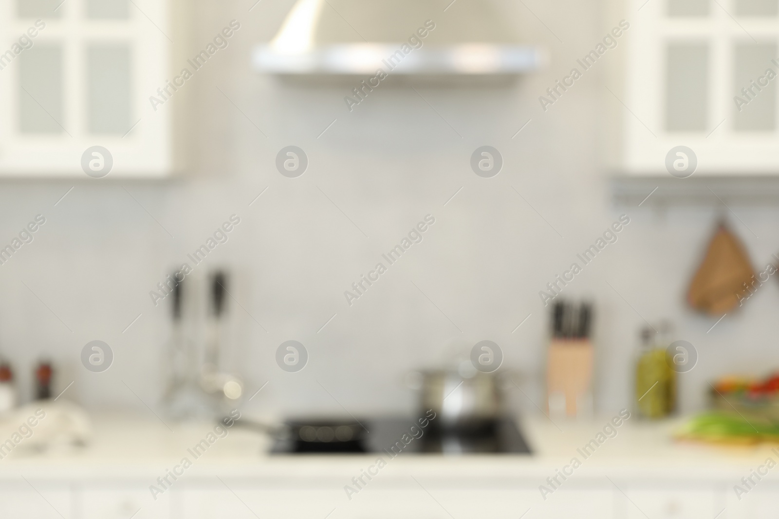 Photo of Blurred view of modern kitchen. Interior design