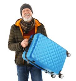 Photo of Mature man with suitcase on white background. Ready for winter vacation
