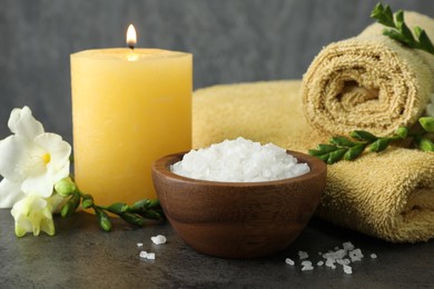 Photo of Composition with different spa products and burning candle, closeup