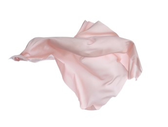 Photo of Beautiful light pink silk floating on white background