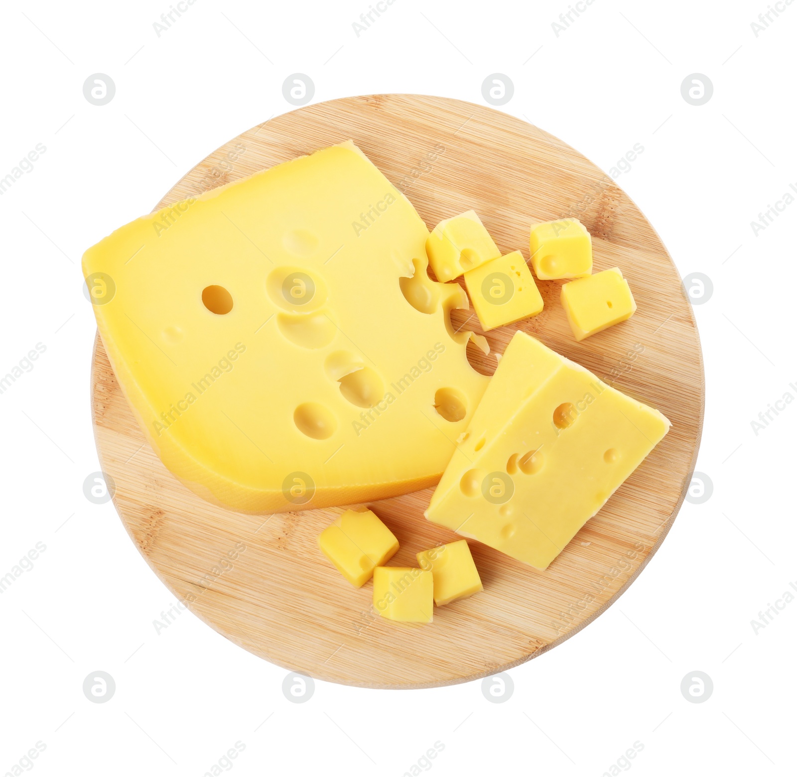 Photo of Cut fresh delicious cheese isolated on white, top view