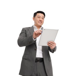 Businessman in suit using tablet on white background, low angle view