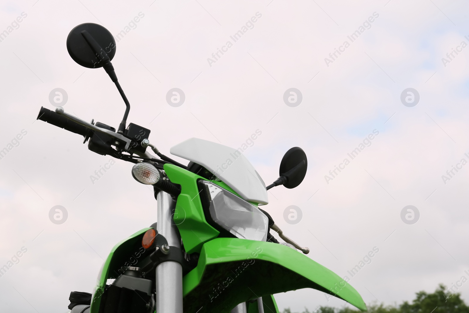 Photo of Stylish cross motorcycle outdoors, low angle view