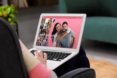 Image of Looking for partner. Man using laptop at home, closeup. Dating site webpage on device screen