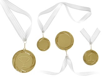Image of Gold medals with ribbons isolated on white, set