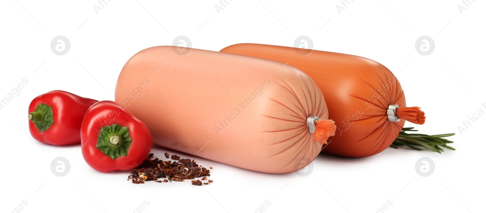 Photo of Tasty boiled sausages with vegetables, rosemary and spices on white background