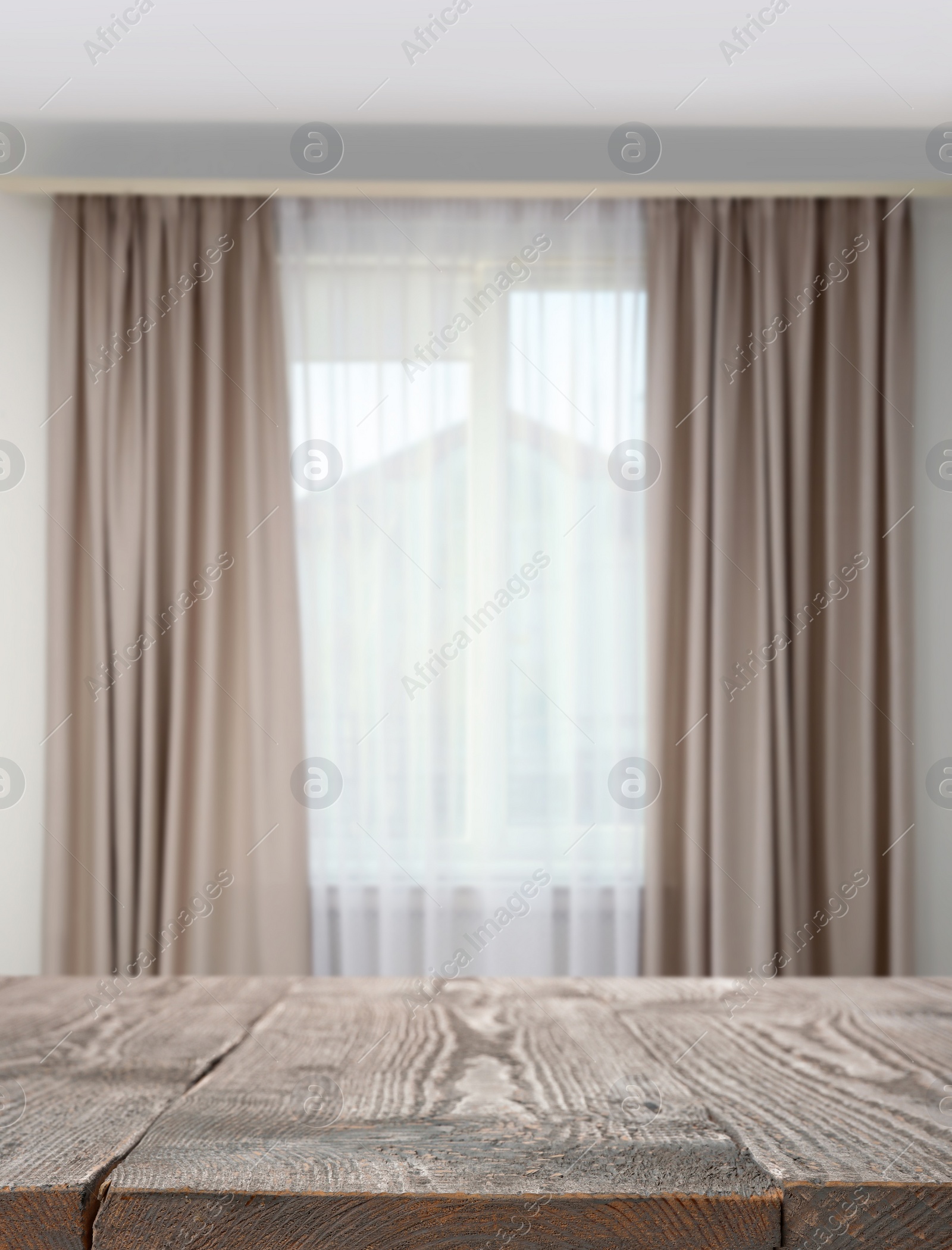 Image of Empty wooden table in room. Space for design