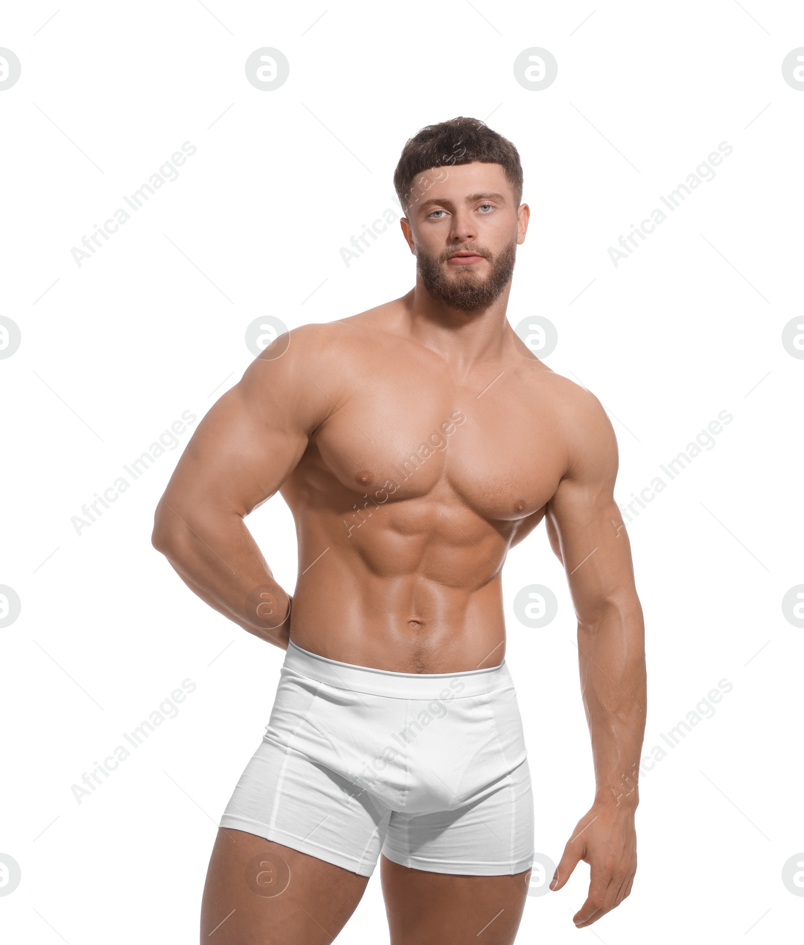 Photo of Handsome muscular man isolated on white. Sexy body