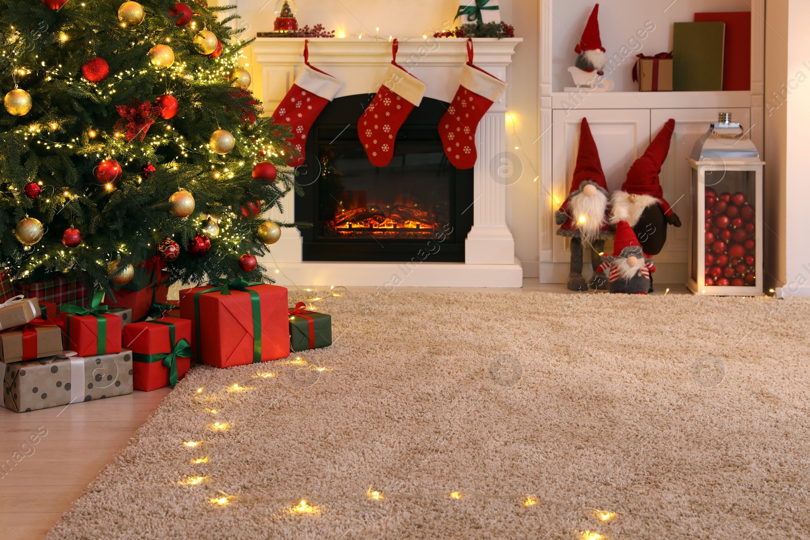 Photo of Living room interior with fireplace and festive decor. Christmas celebration