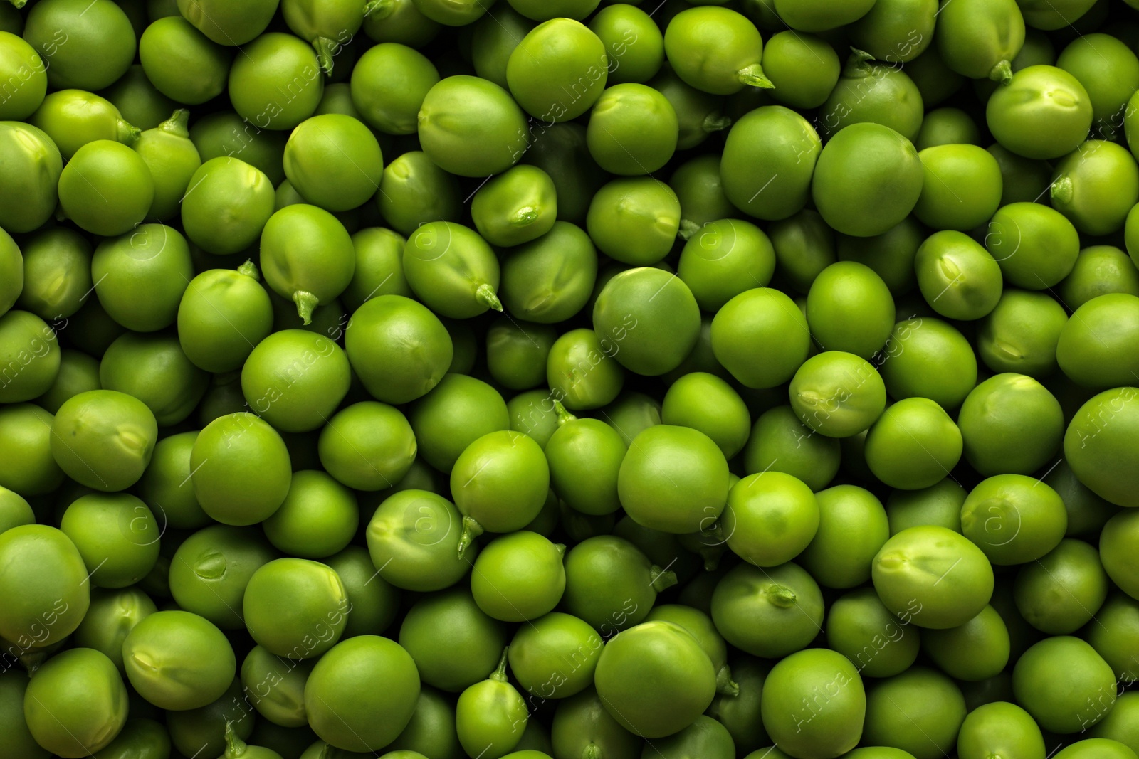 Photo of Fresh raw green peas as background, top view