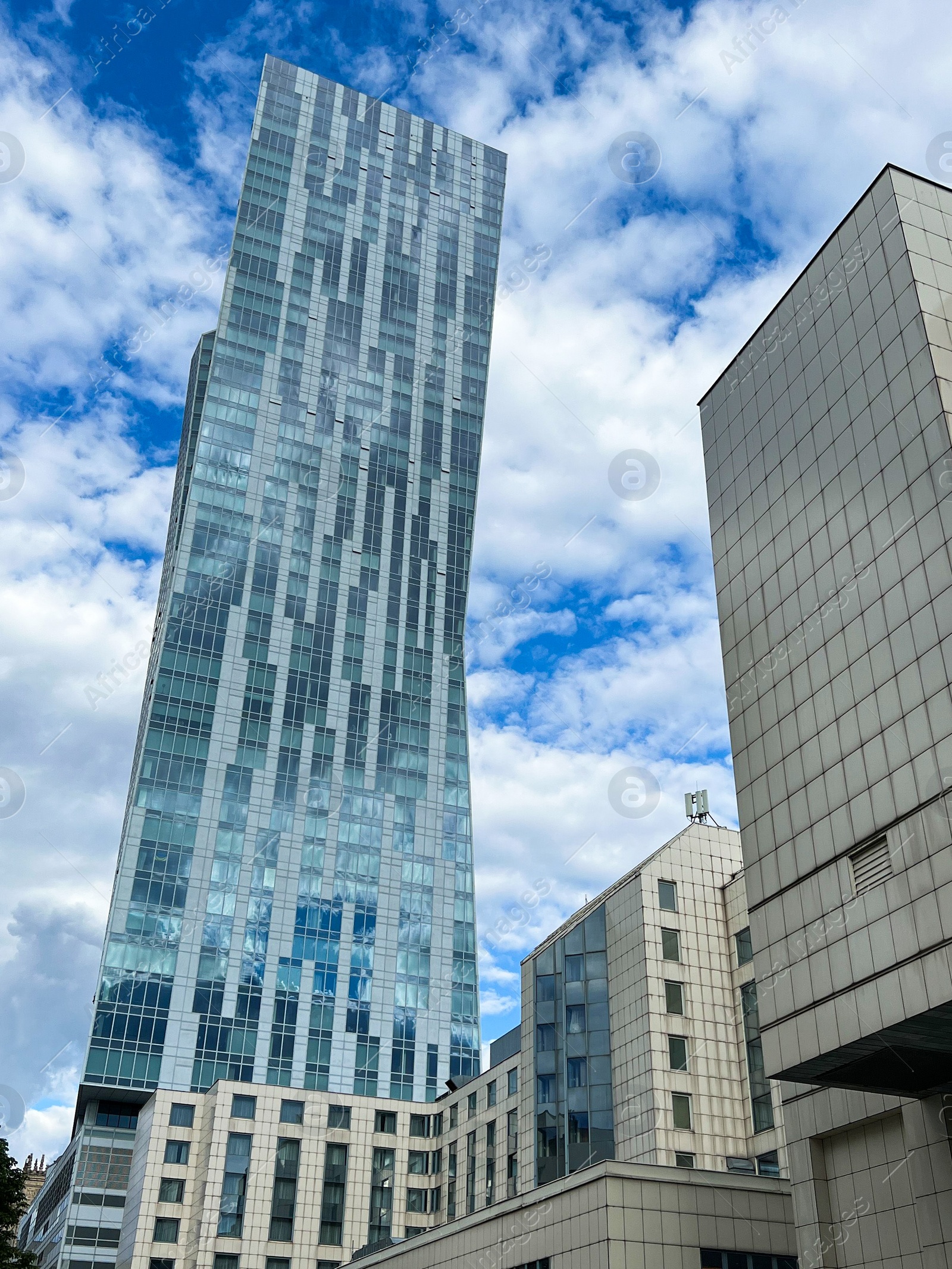 Photo of Beautiful modern buildings on sunny day, low angle view