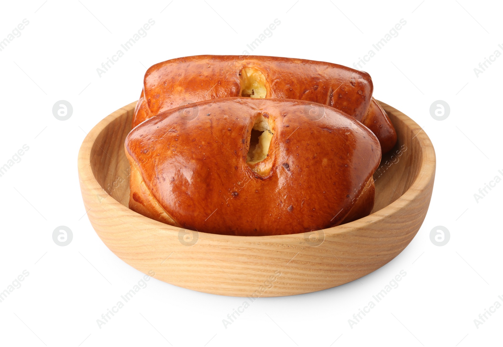 Photo of Wooden bowl with delicious baked patties on white background