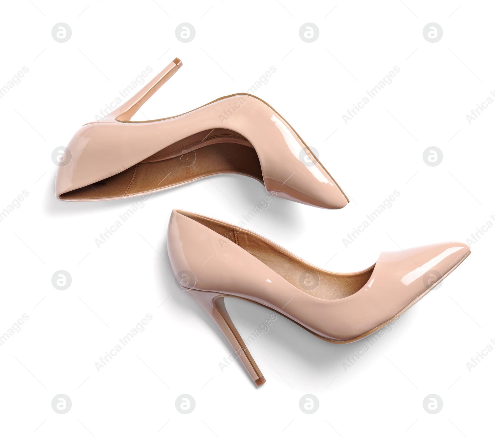 Photo of Pair of beautiful shoes on white background, top view