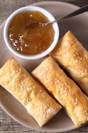 Delicious puff pastry served on table, top view