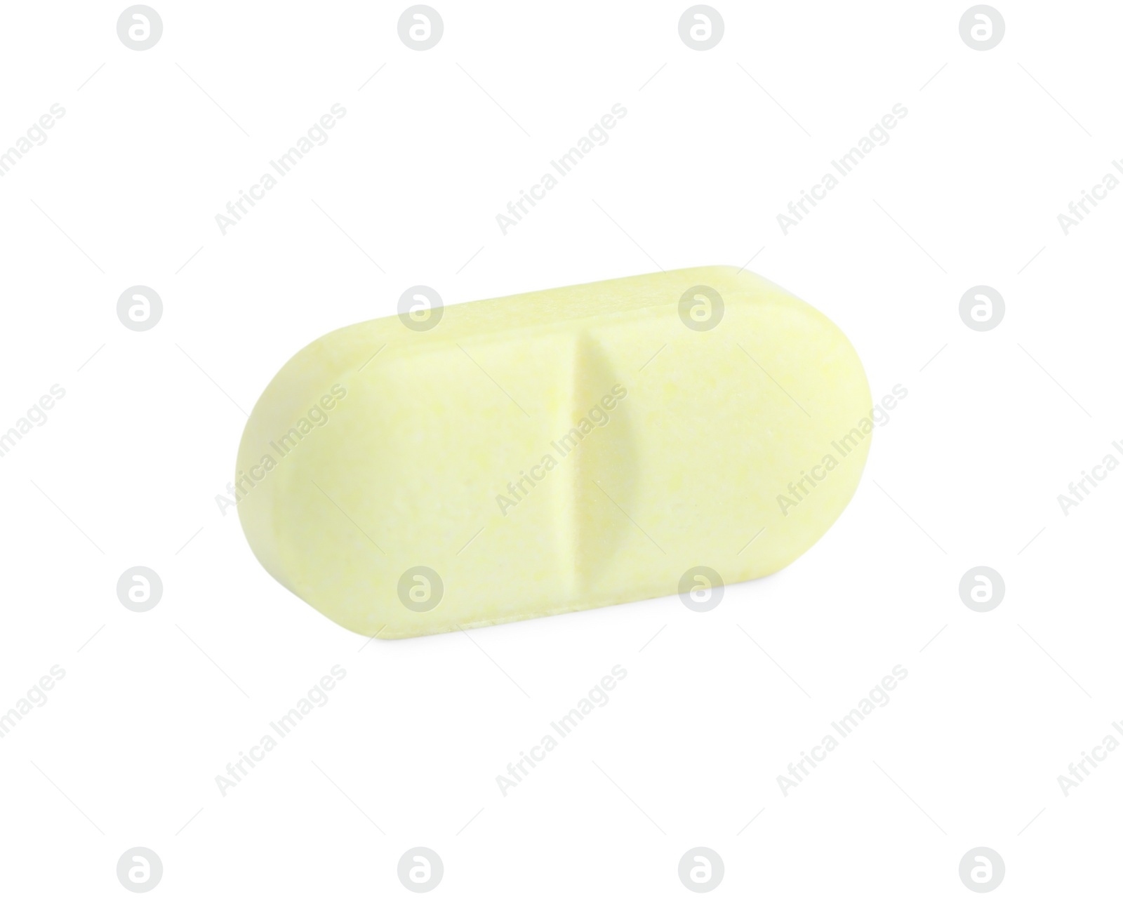 Photo of One yellow pill isolated on white. Medicinal treatment