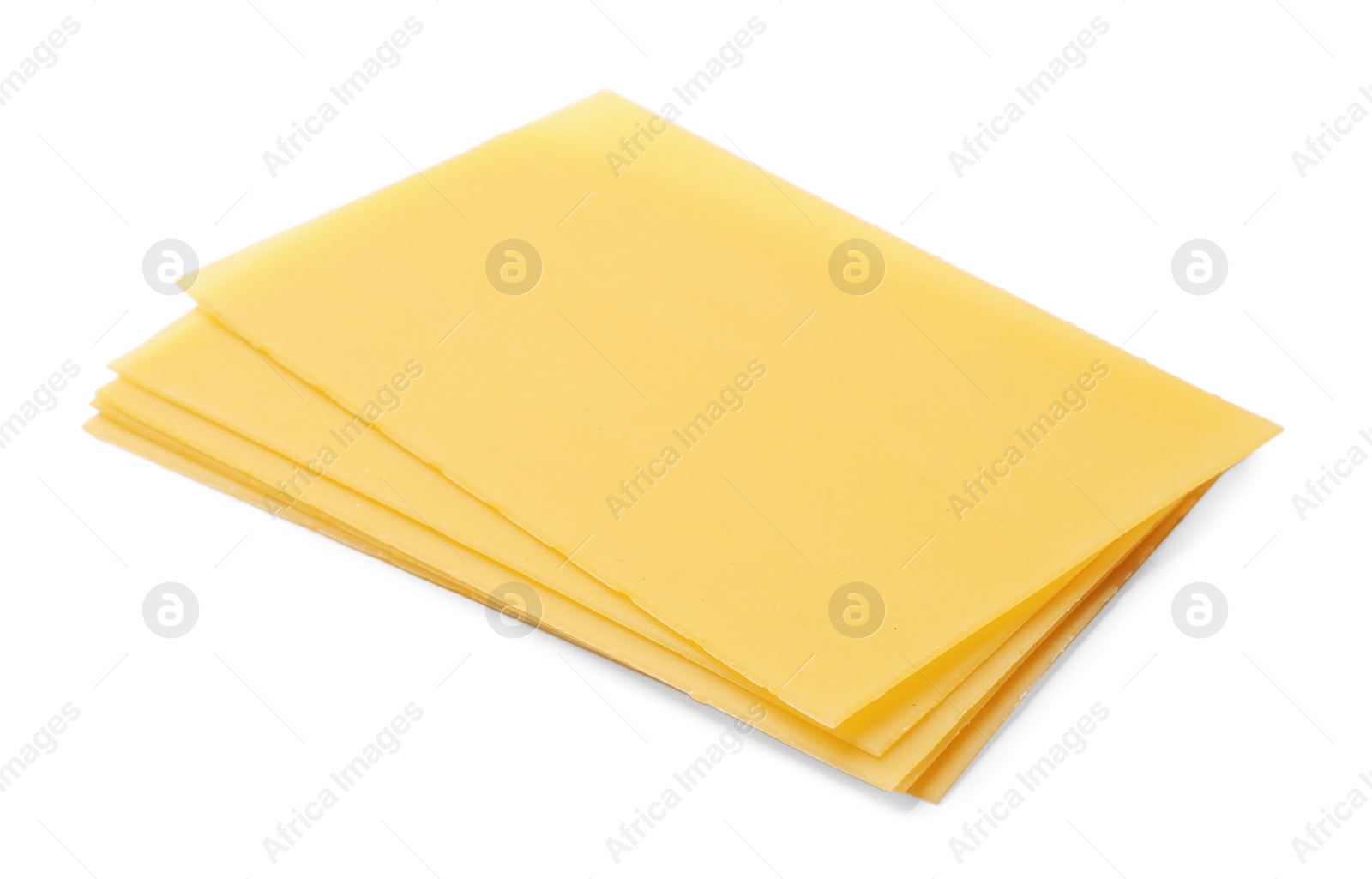 Photo of Stack of uncooked lasagna sheets isolated on white