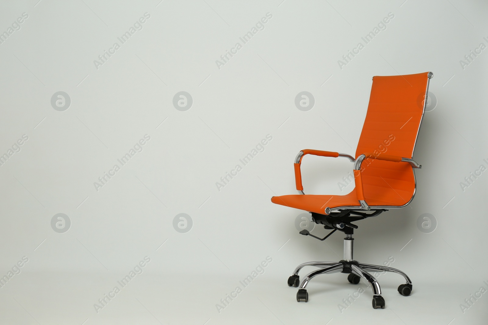 Photo of Comfortable office chair on white background, space for text