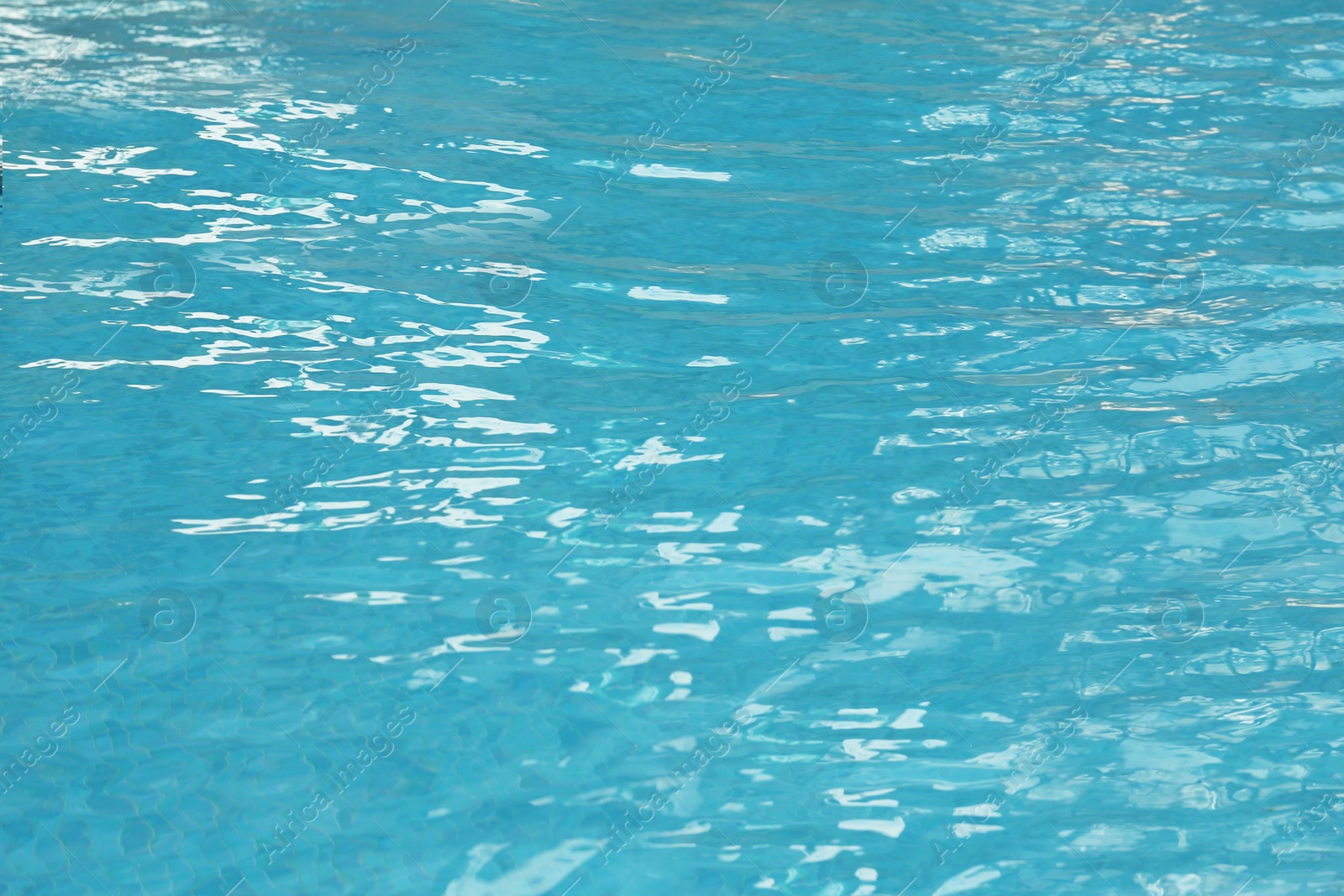 Photo of Outdoor swimming pool with clear rippled water