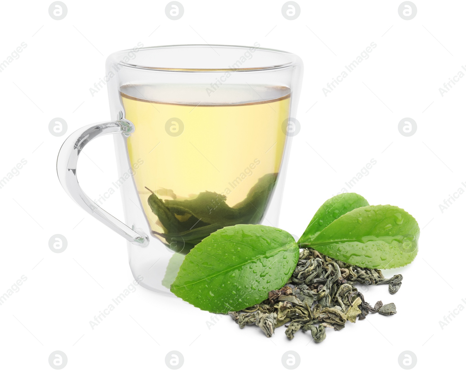 Image of Green tea in glass cup, fresh and dried leaves isolated on white