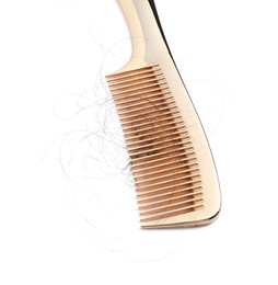 Photo of Comb with lost hair isolated on white