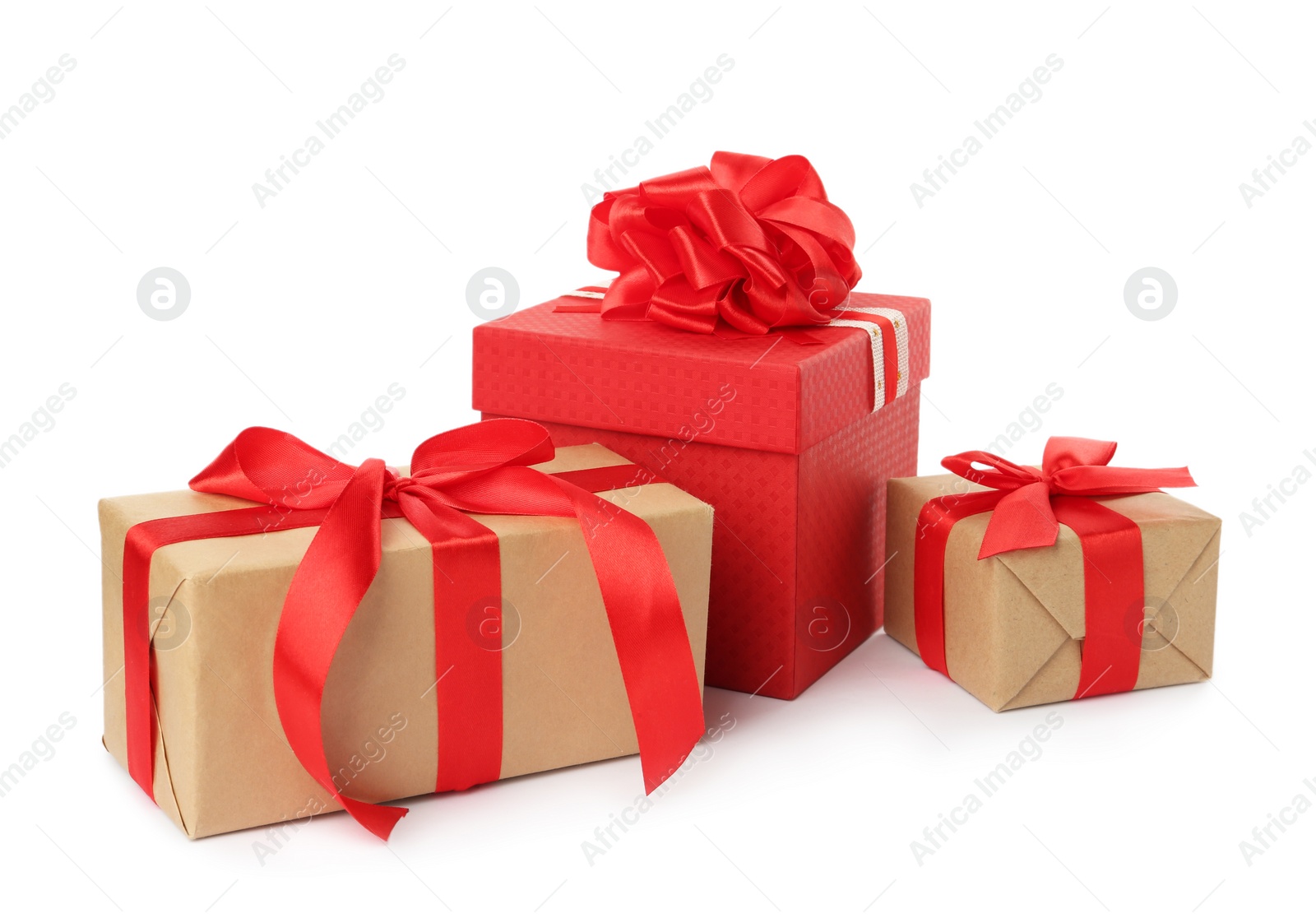 Photo of Gift boxes with red bows on white background