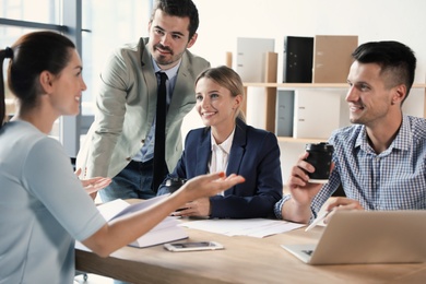 Photo of Office employees having business training at workplace