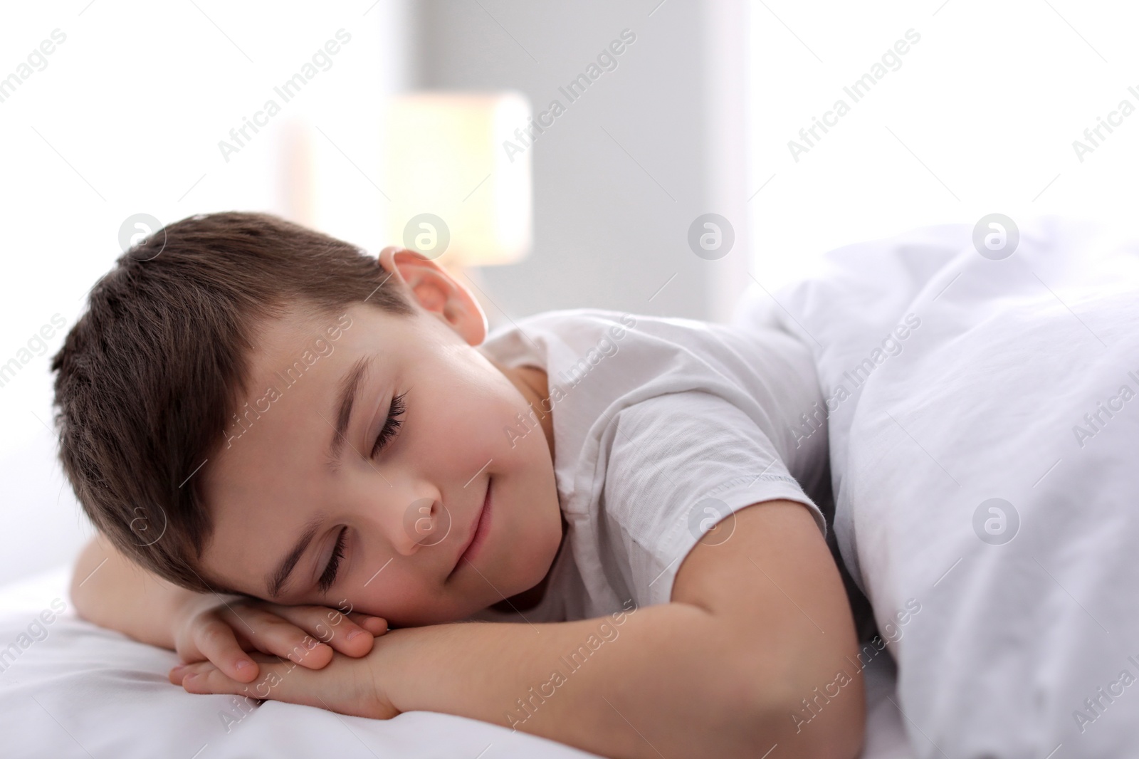 Photo of Cute little boy sleeping at home. Bedtime
