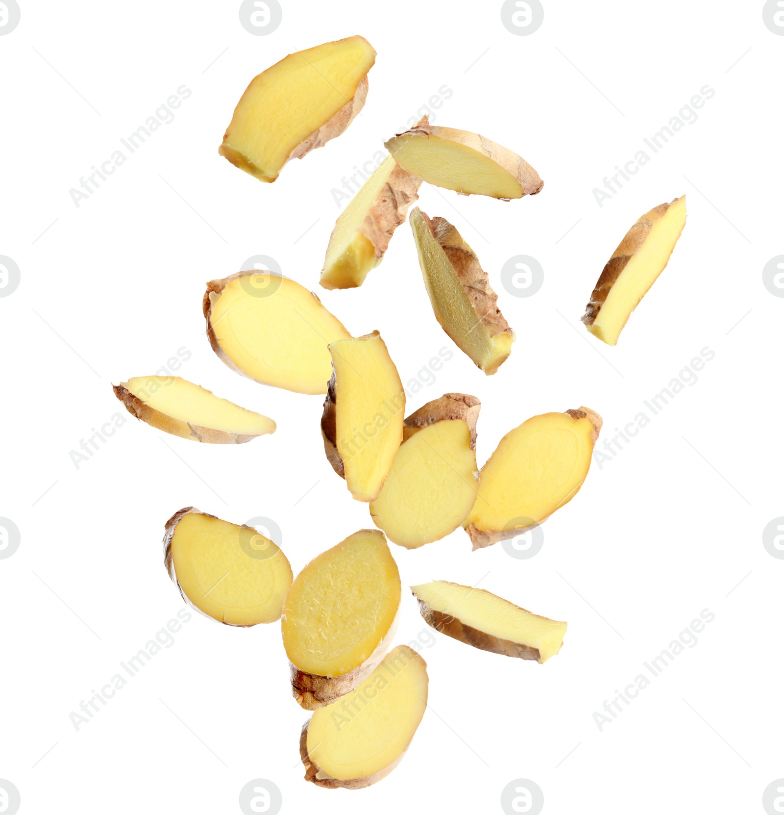 Image of Fresh sliced ginger falling on white background