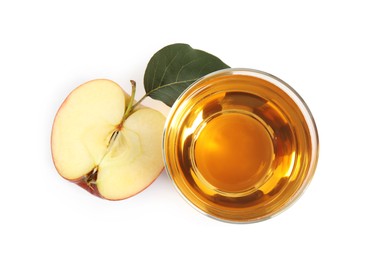 Glass with delicious cider and piece of ripe apple on white background, top view