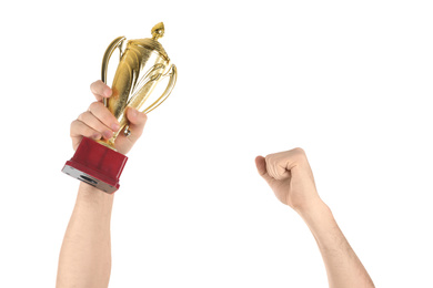 Man holding gold trophy cup on white background, closeup